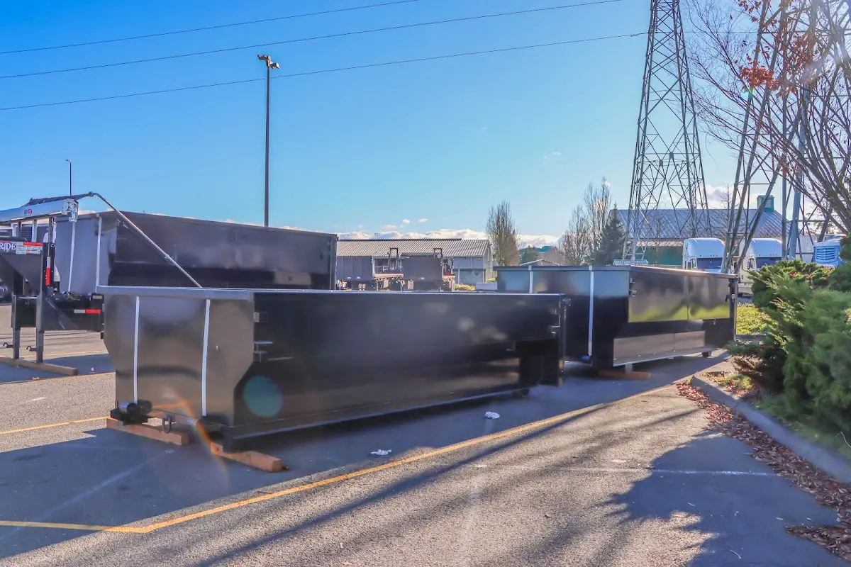 Roll-off dumpster ready for waste disposal at job site for Yard Waste Dumpster Rental in Sedalia